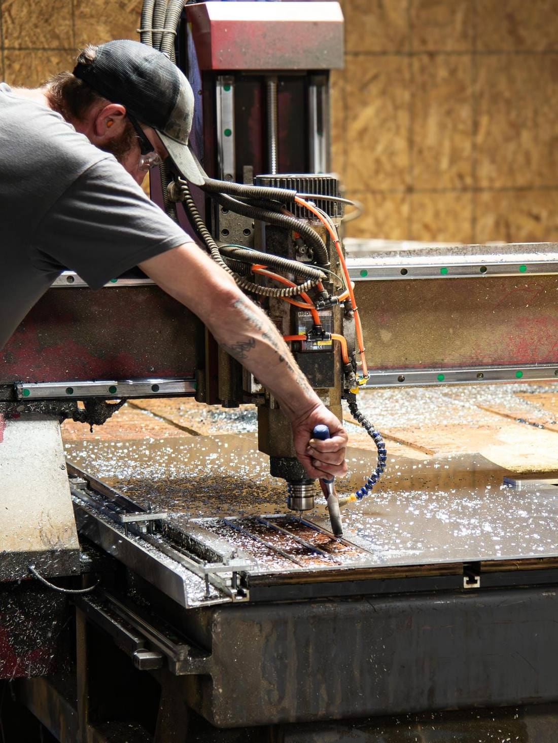 CNC router cutting recycled plastic lumber